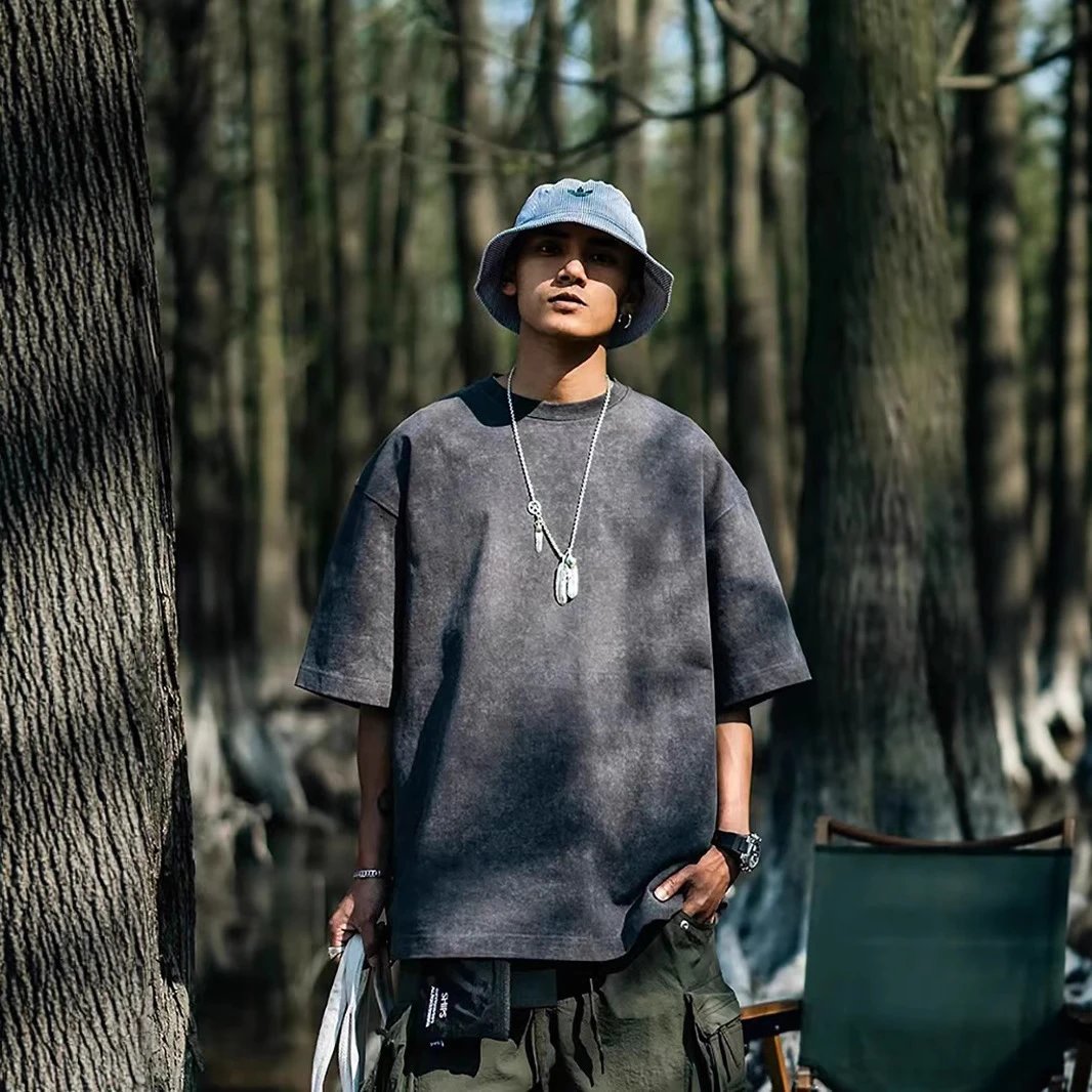 Man wearing an oversized, washed-style cotton T-sh