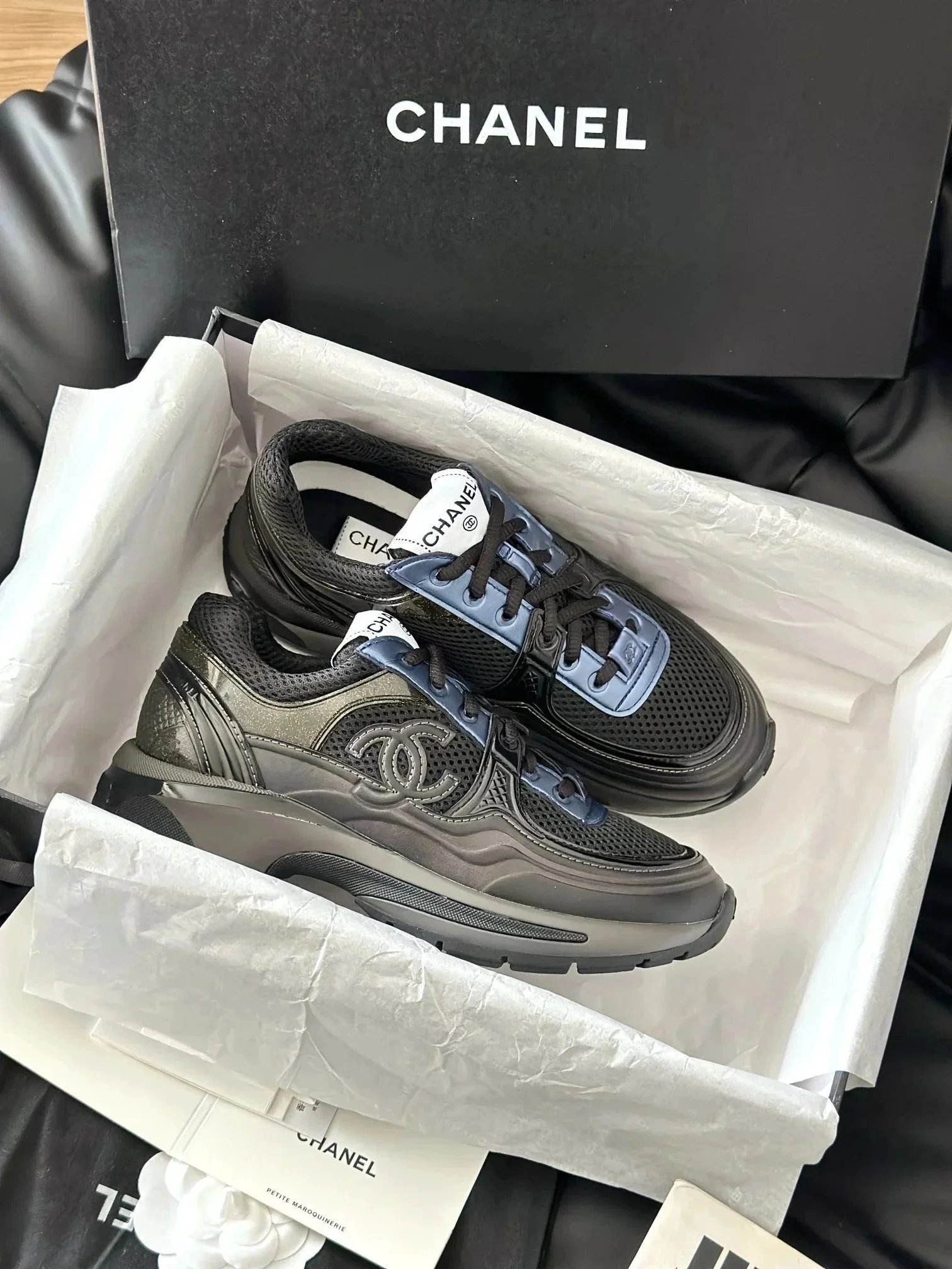 Chanel CC Runner Black and Metallic Gray Sneakers