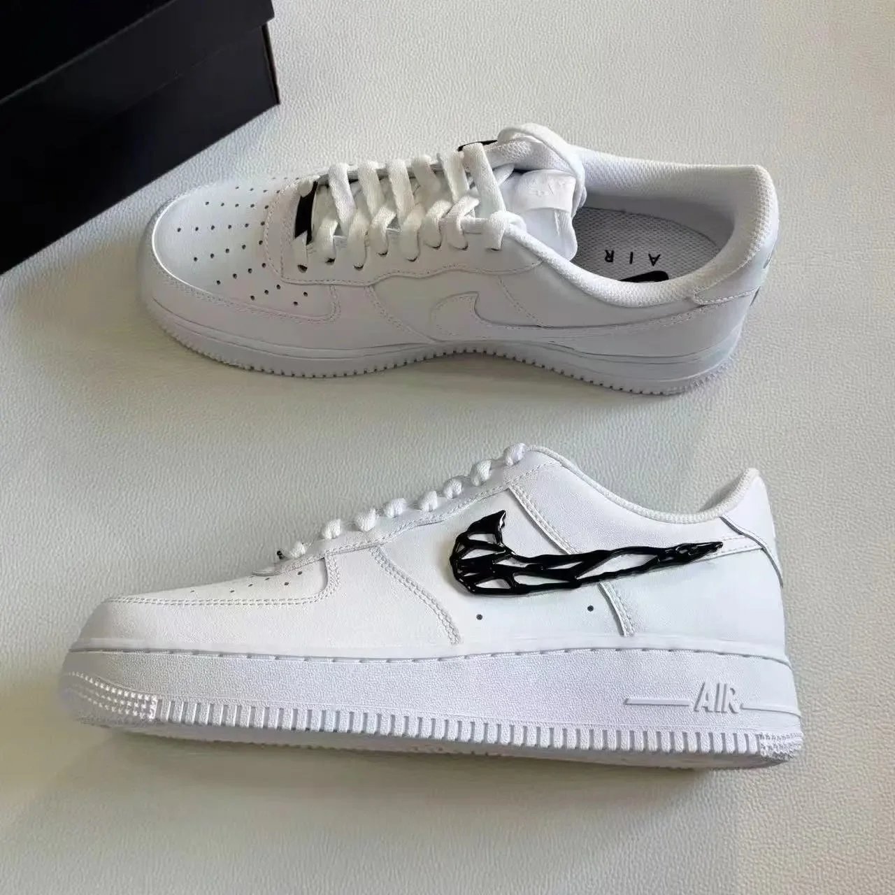 Nike Sneakers Air Force 1 Low with skeletal Swoosh detail — Black