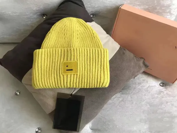 Comme des Garçons Play Yellow Smiley Face Beanie - 1