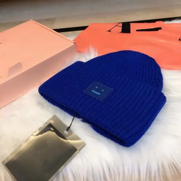 Comme des Garçons Play Blue Ribbed Beanie with Smiley Patch - 1