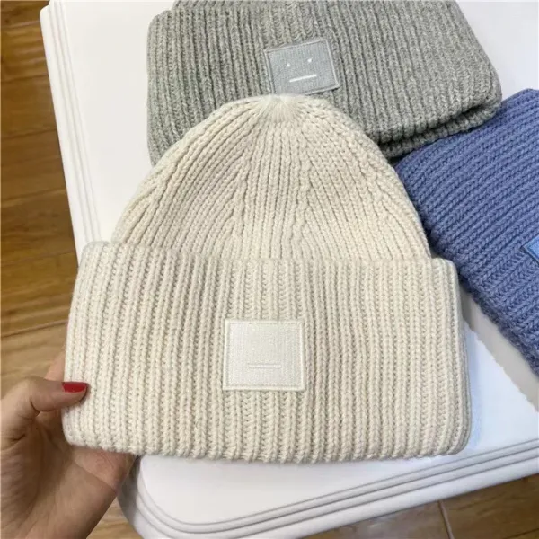 Comme des Garçons Play Beanie with Smiley Patch in Beige - 1