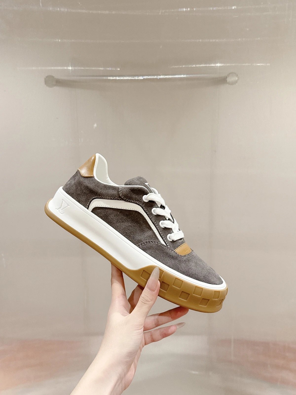 Louis Vuitton Sneakers Low-top lace-up suede with LV monogram details and gum sole — gray