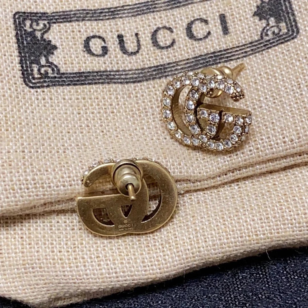 Gucci GG Pearl Gold Tone Stud Earrings