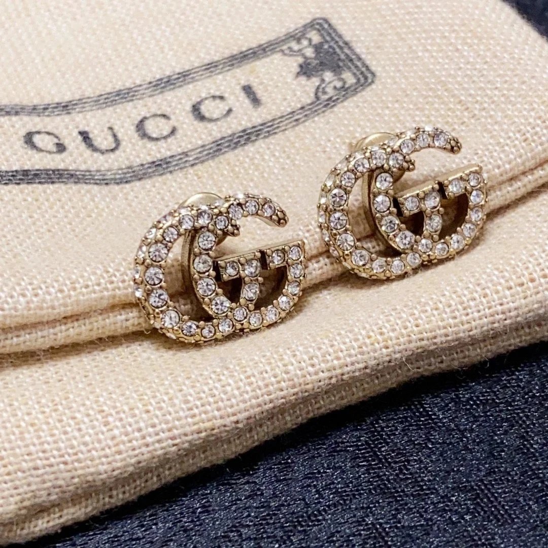 Gucci GG Pearl Gold Tone Stud Earrings
