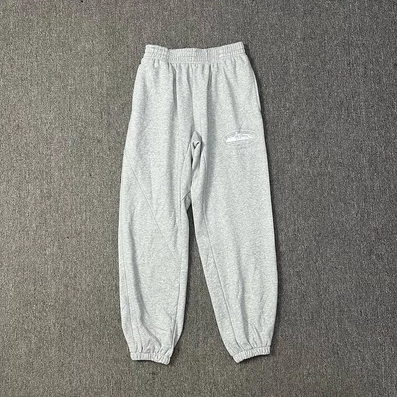 Corteiz: American-Style Streetwear Grey Joggers with Oval Print