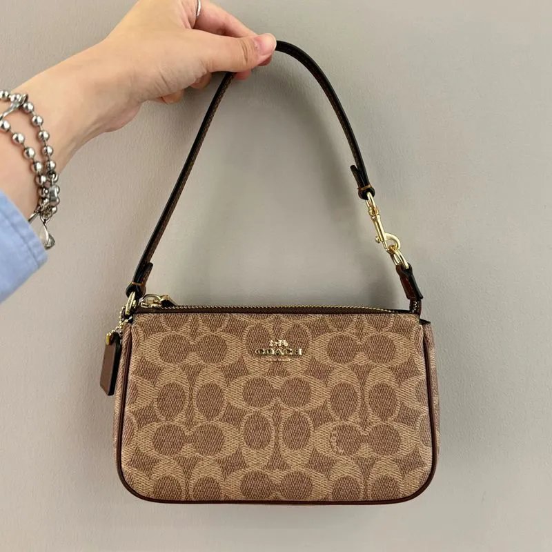 Coach Shoulder Bags Nolita 19 Zip Bag — Caramel-colored airplane box