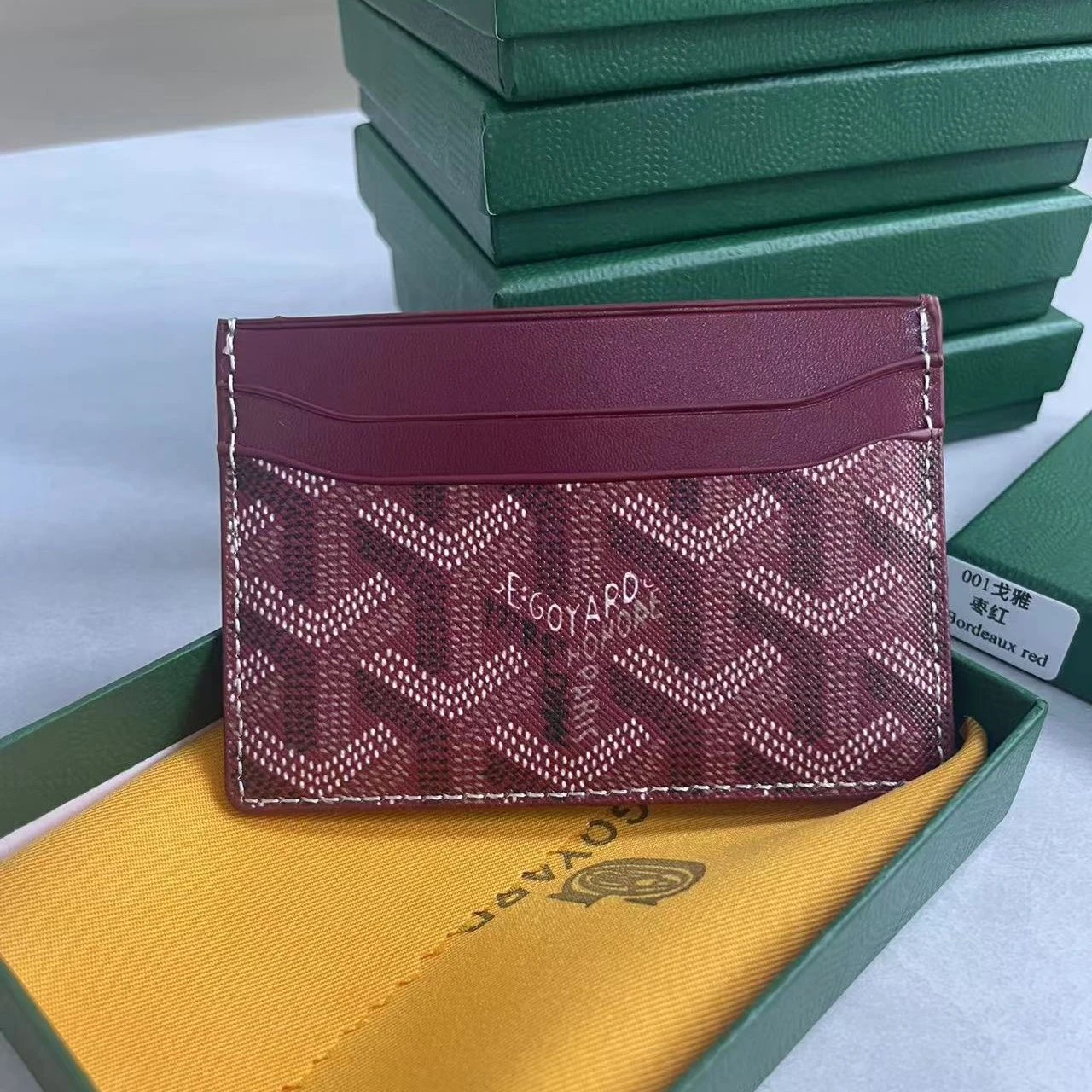 Goyard Wallets & Card Holders Chevron-pattern holder — Wine red