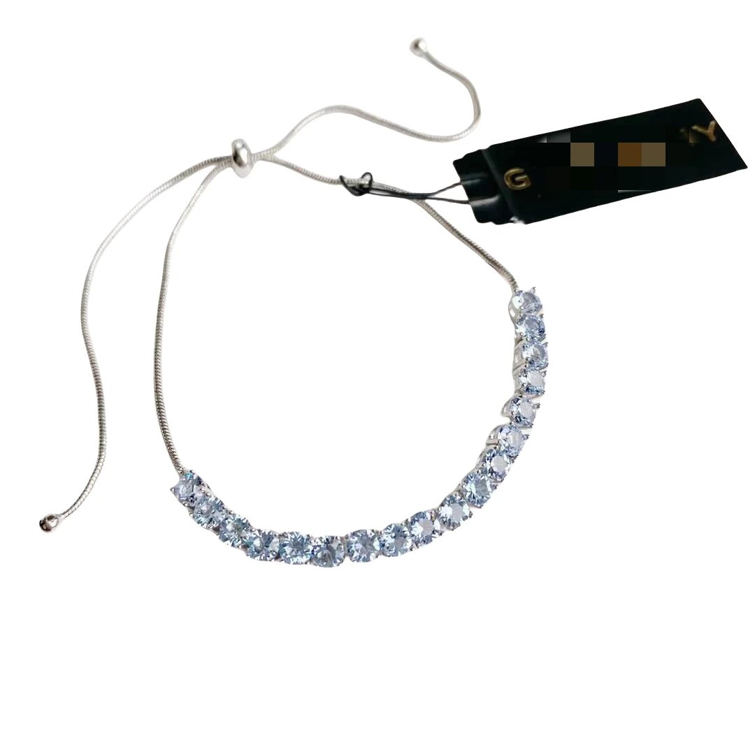 Givenchy Jewelry Single-row crystal bangle bracelet — Platinum blue diamond single-row diamond bracelet