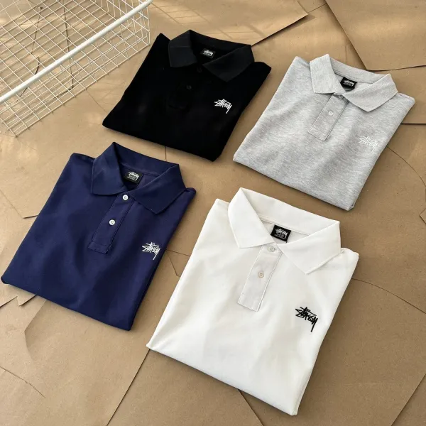 Stussy Classic Logo Polo Shirt in White, Gray, Black, and Navy - 7