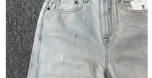 Design Wide-Leg Distressed Light Wash Jeans - 12