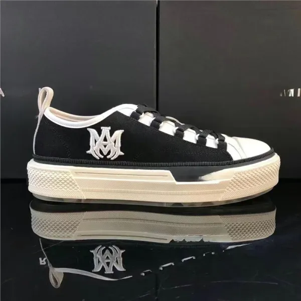 Amiri AM Logo Low-Top Black and White Canvas Sneakers - 1