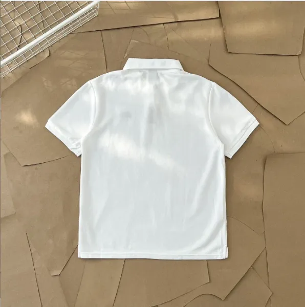 Stussy Classic Logo Polo Shirt in White, Gray, Black, and Navy - 10