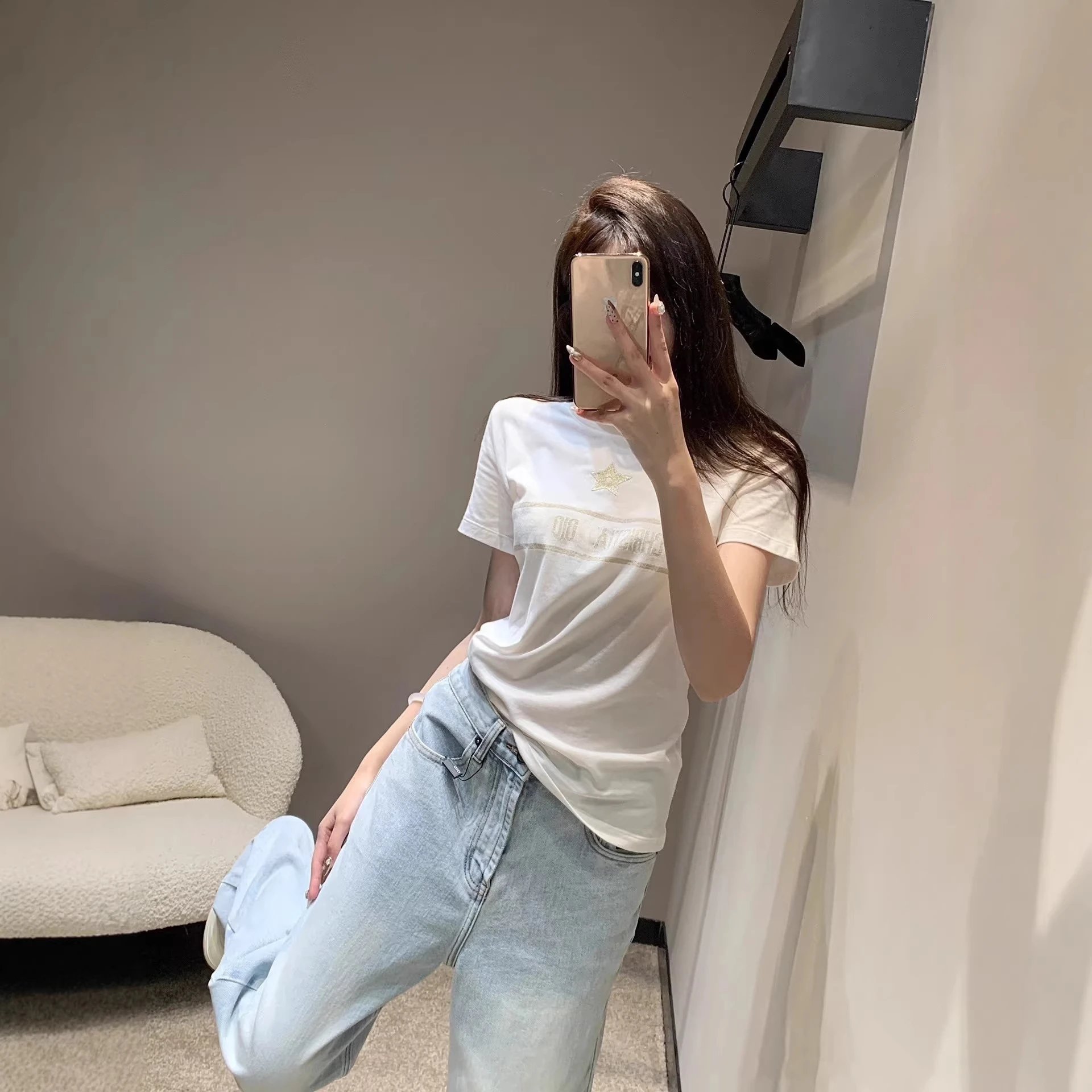 Christia Dior Black Graphic Tee Grey Pleated Skirt Casual Outfit