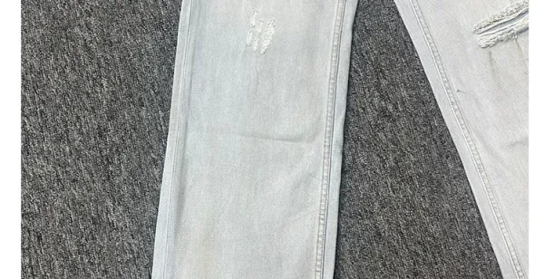 Design Wide-Leg Distressed Light Wash Jeans - 23