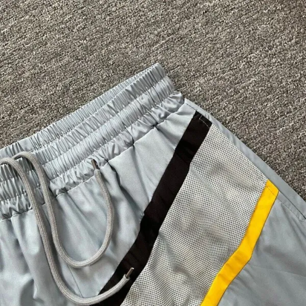 Design Mesh Panel Track Shorts Gray with Yellow and Black Stripe - 21