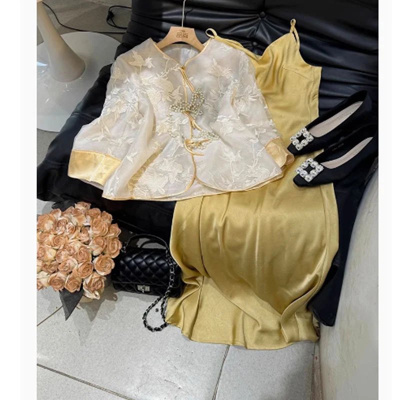 Chanel Quilted Chain Bag Black Handbag with Pearl-Embellished Cheongsam-Style Jacket and Gold Satin Slip Dress