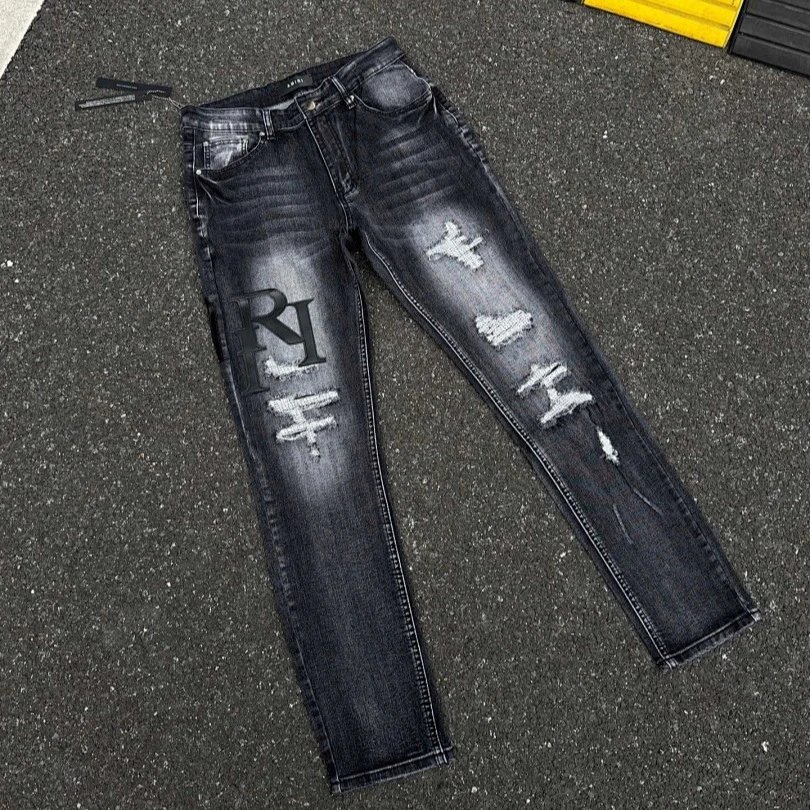 AMIRI Distressed Whisker Denim Jeans