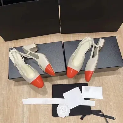 Chanel Two-Tone Gold and Black Slingback Heels - 26