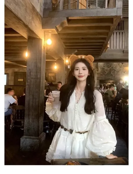 Design White Ruffled Smocked Dress with Bell Sleeves and Brown Leather Boots - 5