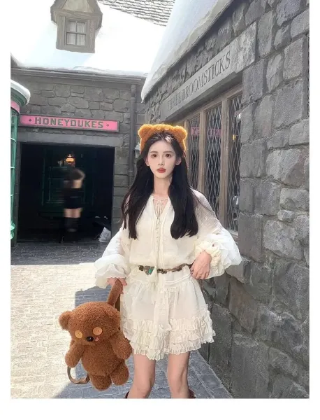Design White Ruffled Smocked Dress with Bell Sleeves and Brown Leather Boots - 10