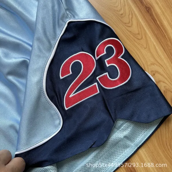 Design Basketball Shorts Light Blue with Navy and Red Numbering - 23