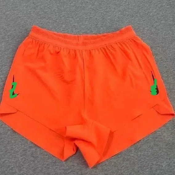 Design Neon Orange Graphic Shorts - 1