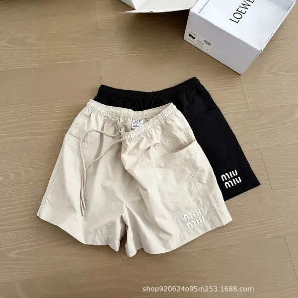 Miu Miu Logo-Embroidered Drawstring Shorts Beige and Black - 1