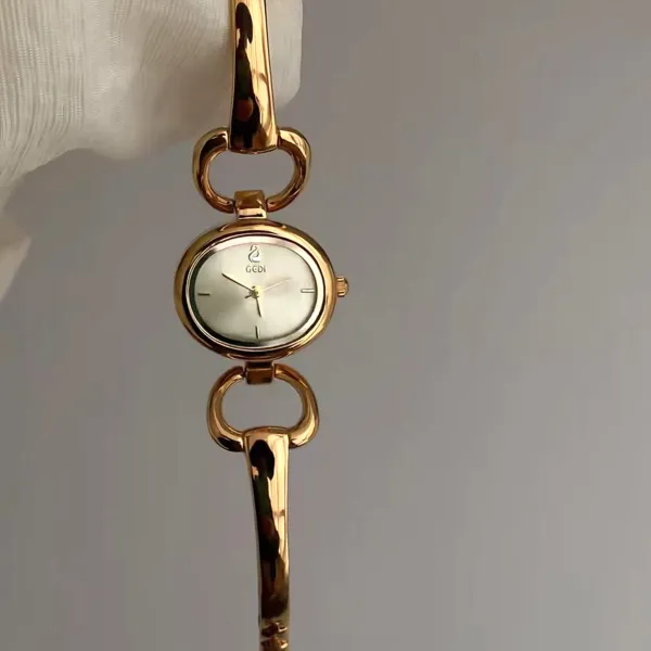 Design GCDI Oval Dial Gold-Tone Bangle Watch White Dial Watches - 1