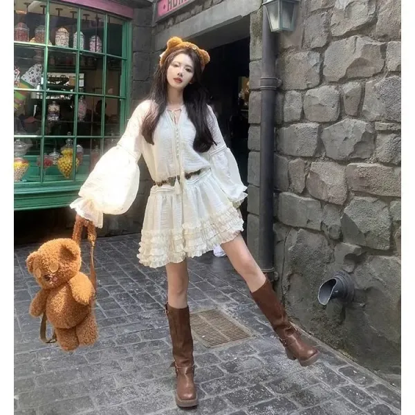 Design White Ruffled Smocked Dress with Bell Sleeves and Brown Leather Boots - 17