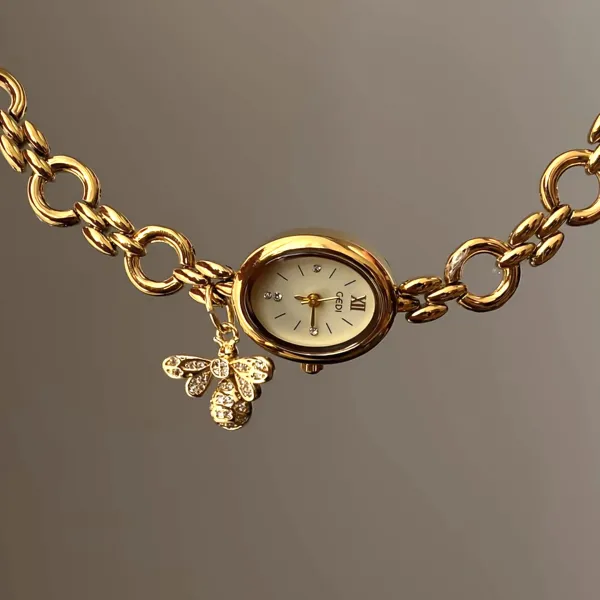 Design GEDI Oval Dial Gold-Tone Watch with Crystal Bee Charm Watches - 1