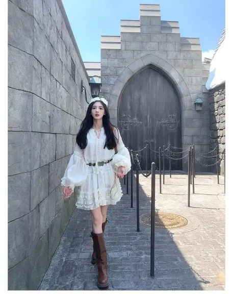 Design White Ruffled Smocked Dress with Bell Sleeves and Brown Leather Boots - 11