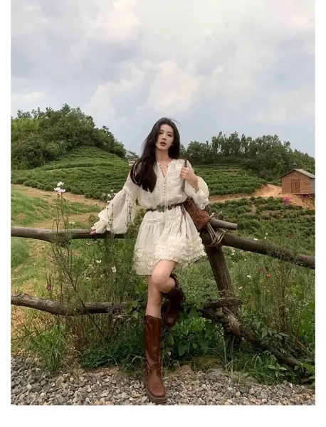 Design White Ruffled Smocked Dress with Bell Sleeves and Brown Leather Boots - 15