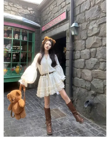 Design White Ruffled Smocked Dress with Bell Sleeves and Brown Leather Boots - 7