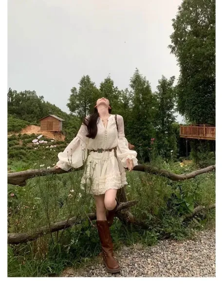 Design White Ruffled Smocked Dress with Bell Sleeves and Brown Leather Boots - 14