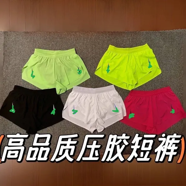 Design Running Shorts Orange with Green Logo - 2
