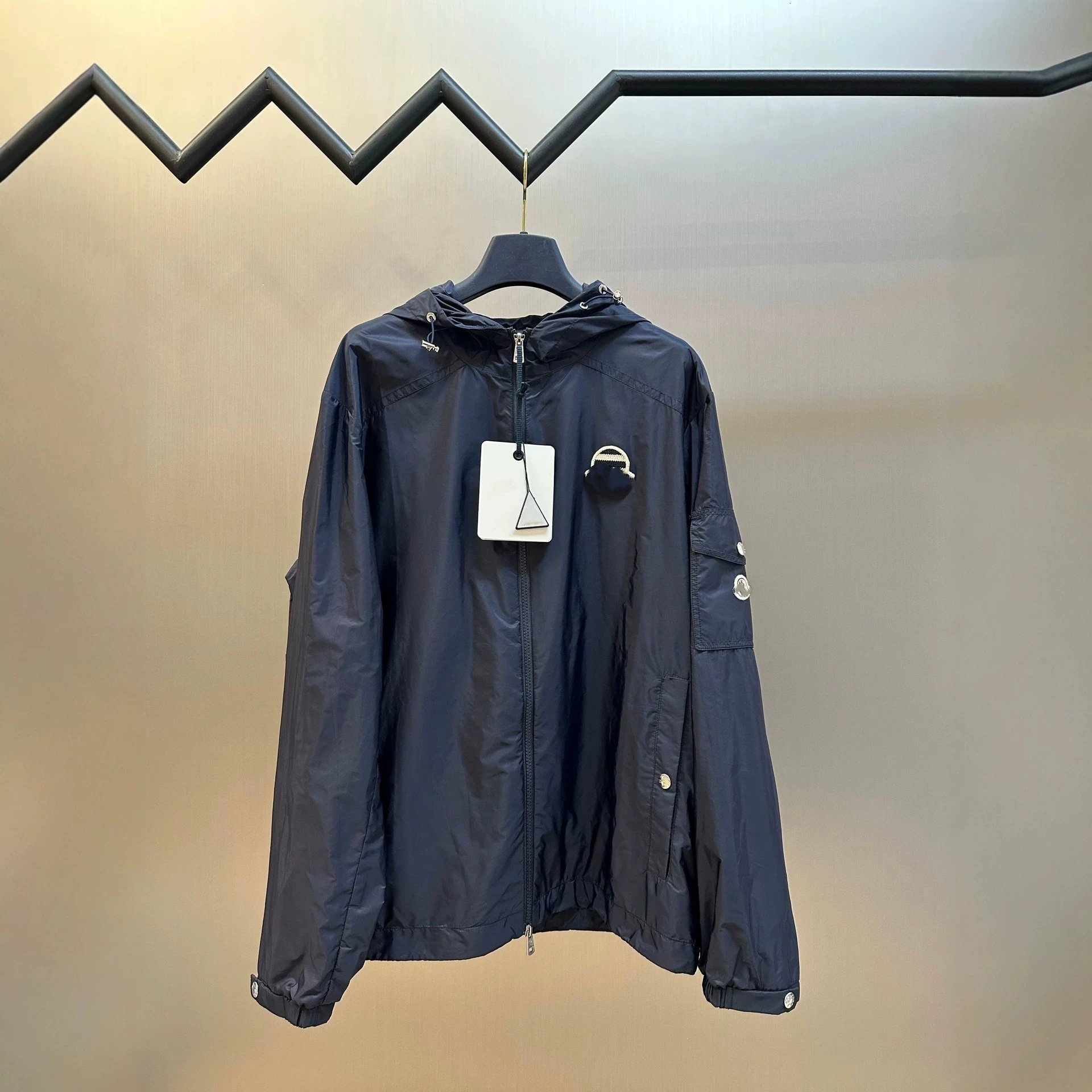 White Hooded Windbreaker Jacket With Embroidered Logo And Snap Pocket