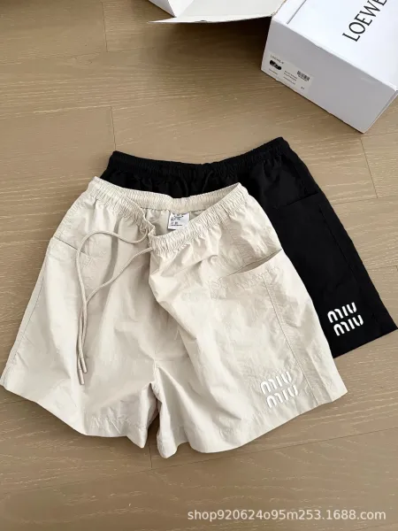 Miu Miu Logo-Embroidered Drawstring Shorts Beige and Black - 6