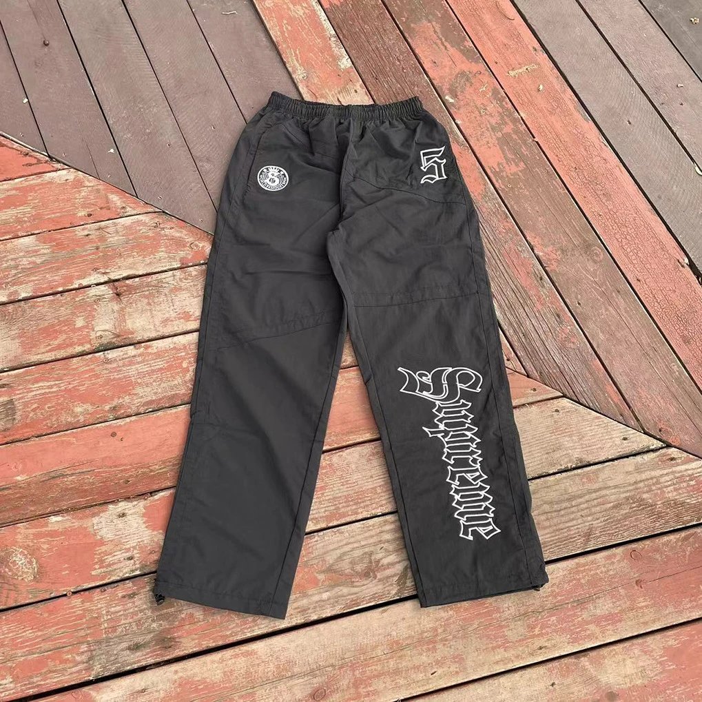 Supreme Gothic Logo Track Pants Black
