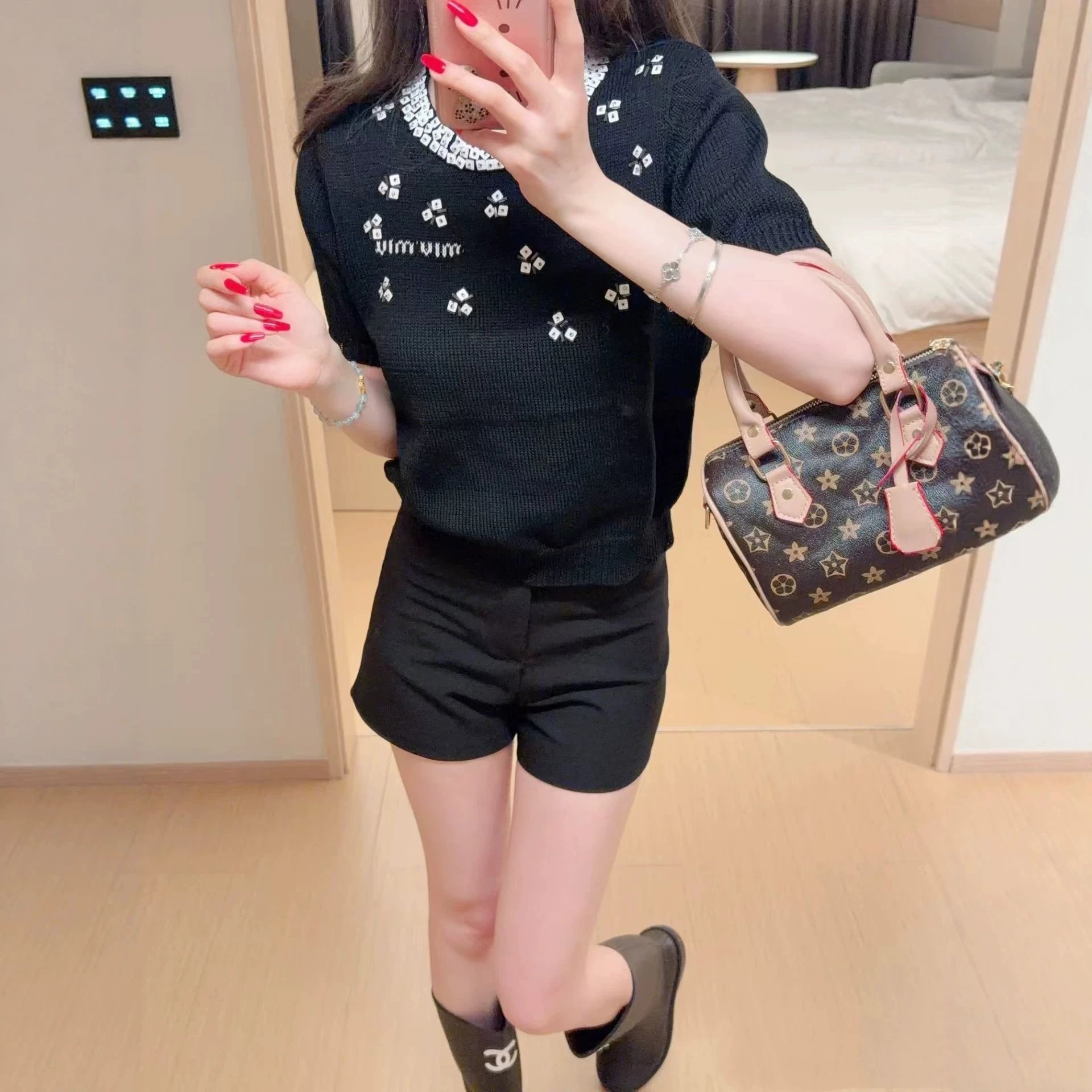 Black Knit Top with White Crystal Floral Embellishment Casual