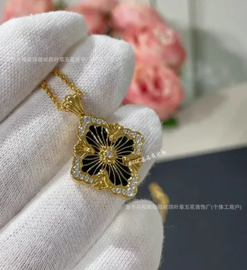 Design Four-Leaf Clover Pendant Necklace in Gold with Black Enamel and Diamonds Jewelry - 1