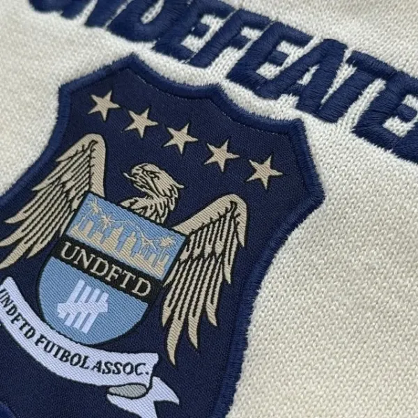 Design Undefeated x Manchester City Polo Shirt Black and Beige Polo Shirt - 28