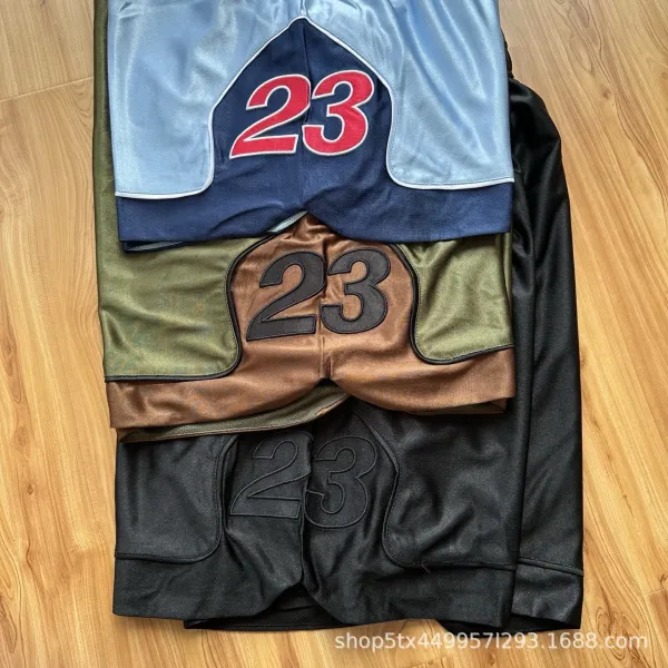 Design Basketball Shorts Light Blue with Navy and Red Numbering - 24