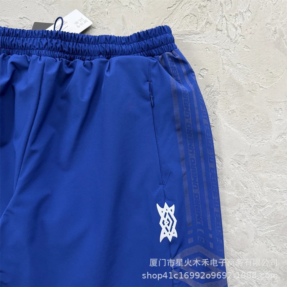 Umbro Windbreaker Jacket Royal Blue with White Stripes and Graphic Print - 21
