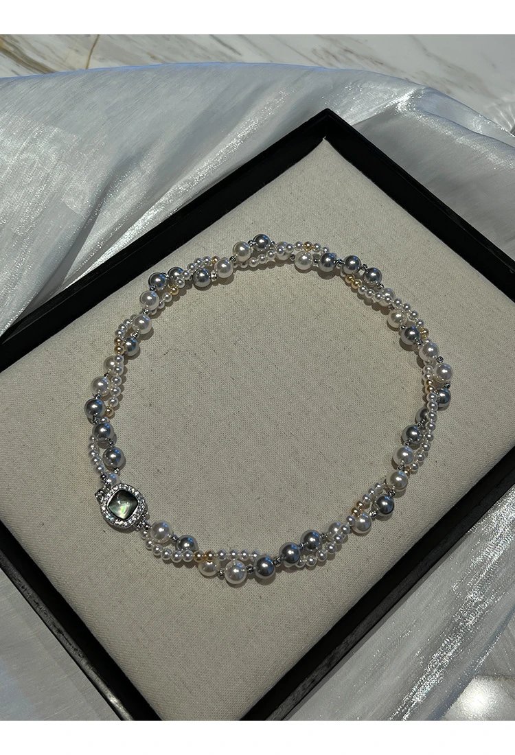 Design Multi-Strand Pearl Bracelet with Iridescent Center Stone Jewelry - 24