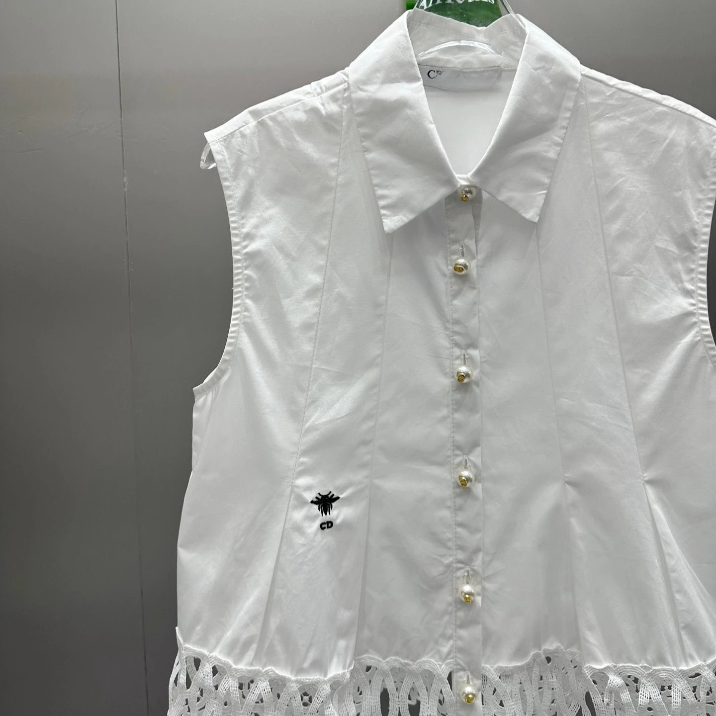 White Sleeveless Button-Up Shirt with Lace Hem and Bee Embroidery