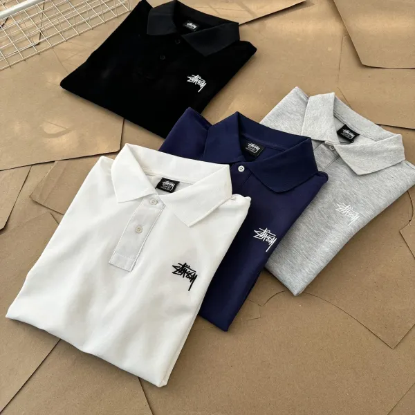 Stussy Classic Logo Polo Shirt in White, Gray, Black, and Navy - 4