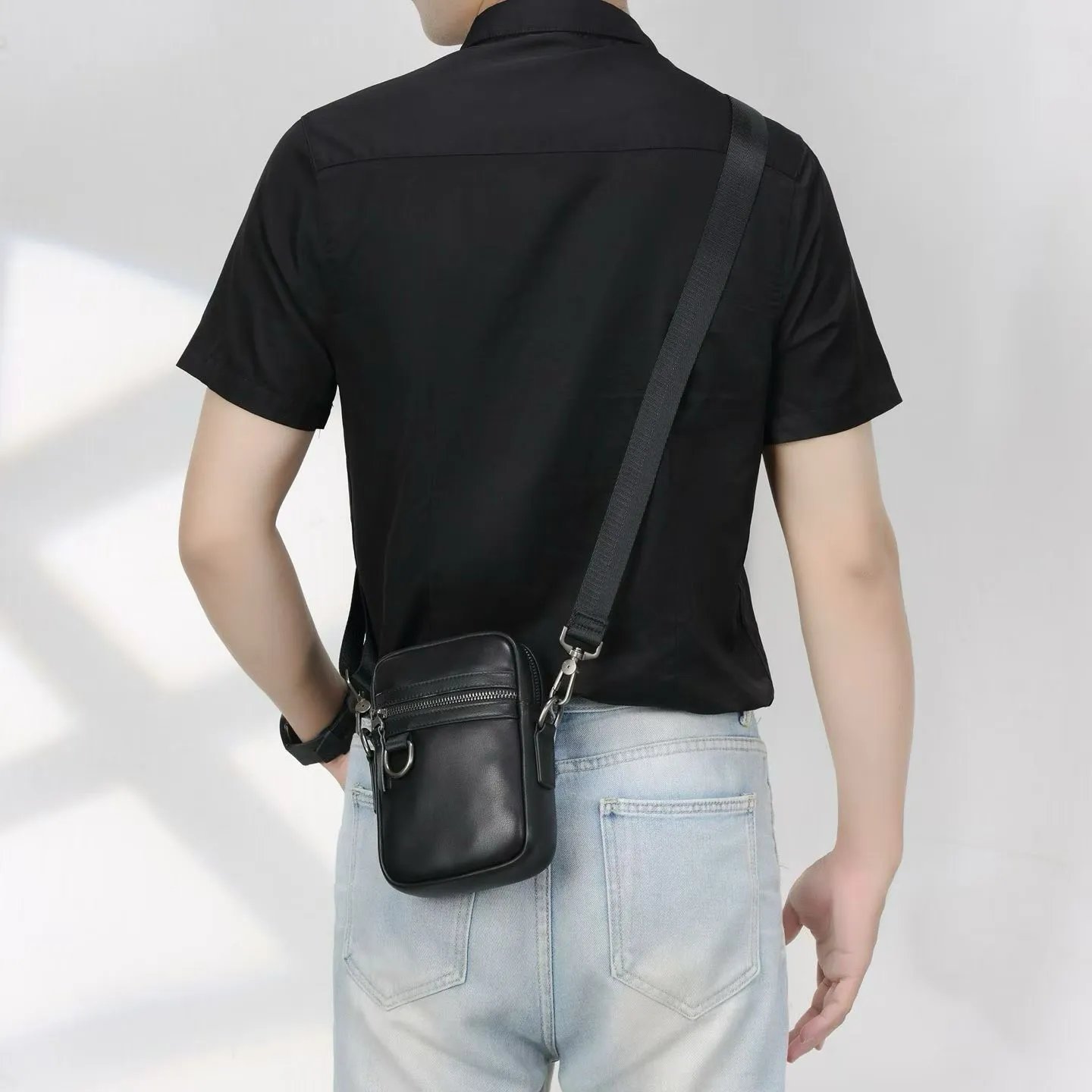Black Leather Crossbody Bag With Zipper Pocket And Metal Hardware