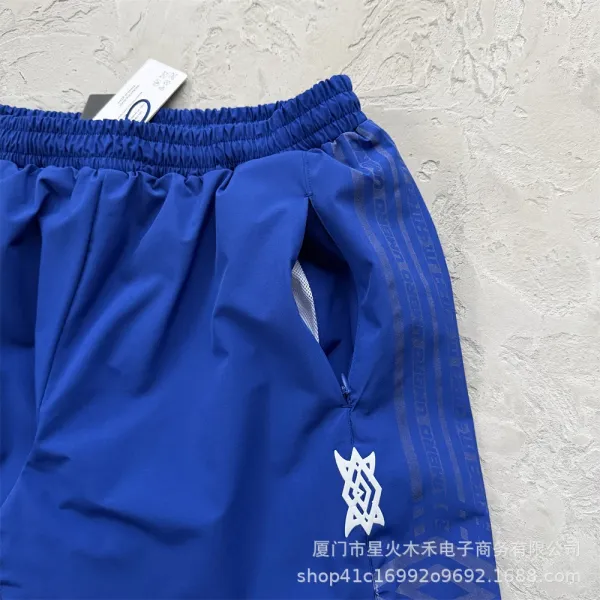 Umbro Windbreaker Jacket Royal Blue with White Stripes and Graphic Print - 25