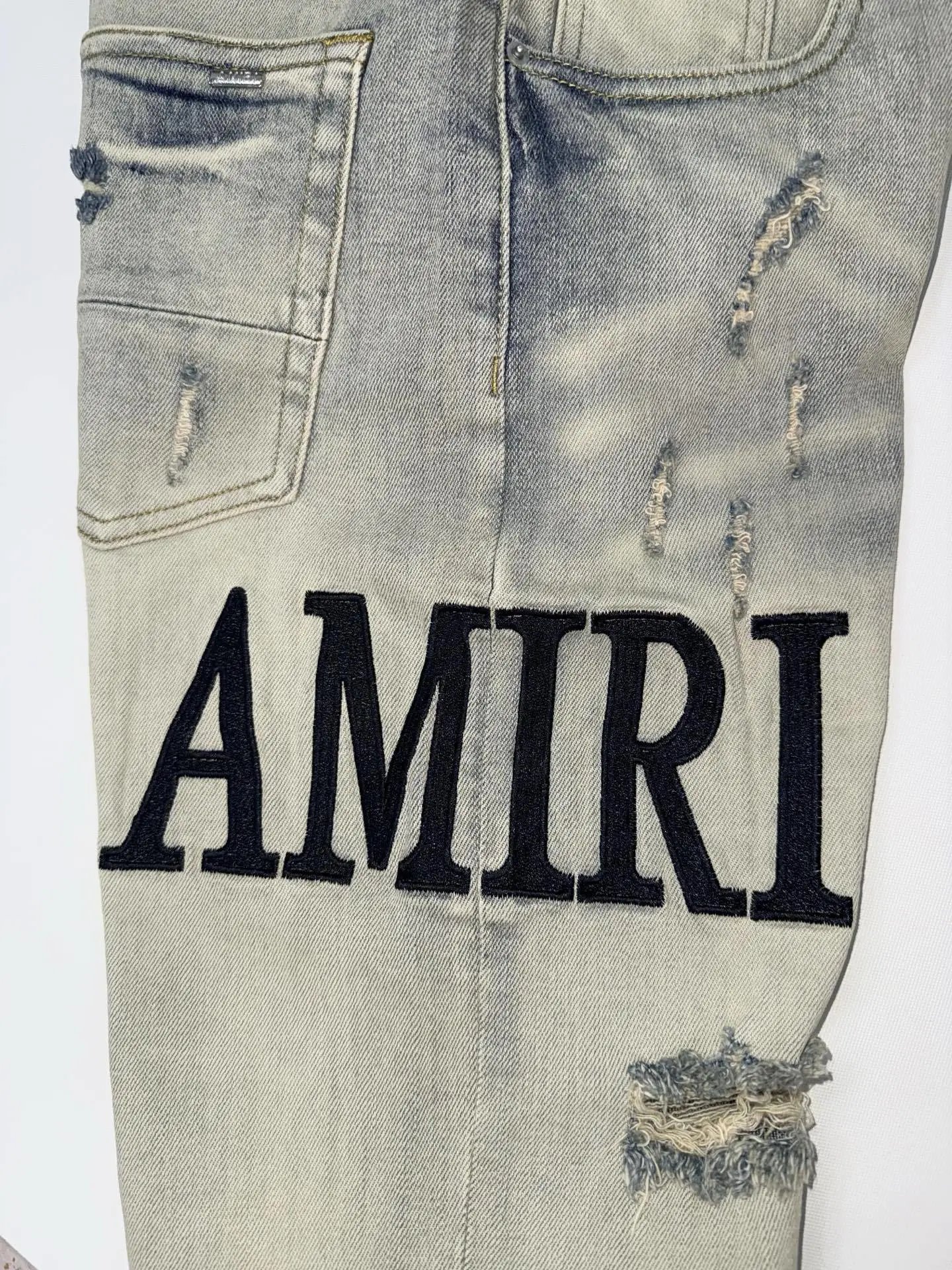 Amiri Distressed Logo Print Slim Fit Jeans Light Wash - 9